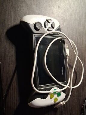 Source Unknown White Handheld Gaming Console with Green & Yellow Buttons